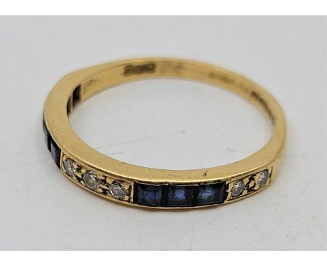 An 18ct. gold, sapphire and diamond half hoop ring, pave set seven round cut diamonds and channel set six square cut sapphire