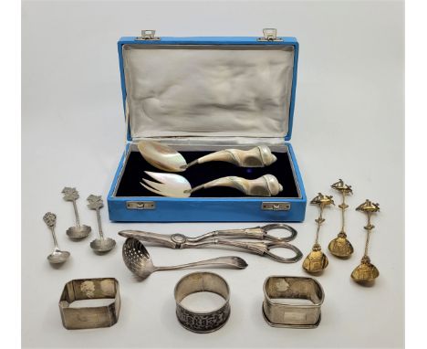 A collection of small silver table ware, to include: a Russian silver napkin, impressed marks including for 84 zolotniks, tog