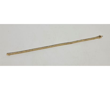 A 14ct. yellow gold diamond line bracelet, set eighty-five round brilliant-cut diamonds (ETDW 2.25 carats), length 20.5cm. (g