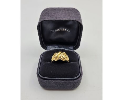 A Tiffany &amp; Co. 18ct. yellow gold ring,&nbsp;signed to shank, size UK J.&nbsp;(11.9g)&nbsp;