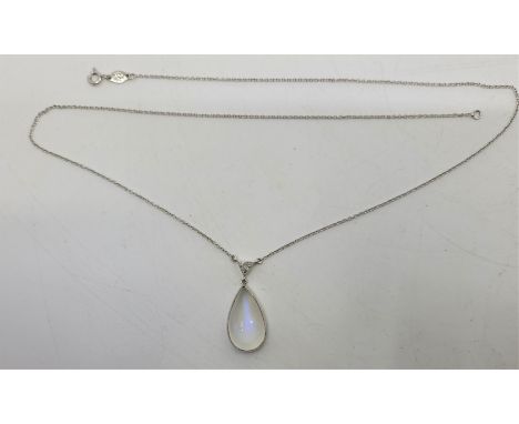An Italian 18ct. white gold, moonstone and diamond pendant necklace, the fine link 18ct. white gold chain with pendant set tr