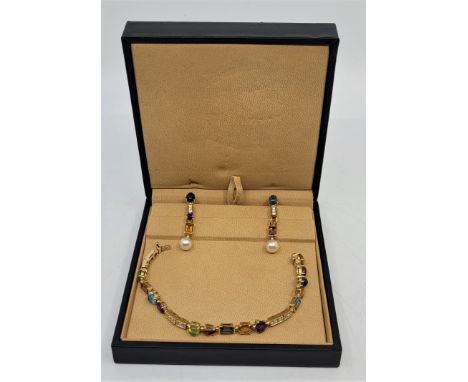 A Bulgari "Allegra" 18ct. gold, multi gem and diamond set bracelet and drop earrings en suite, the bracelet pave set fifteen 