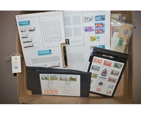 A box of loose postage stamps; first day covers; and a GB stamp album.