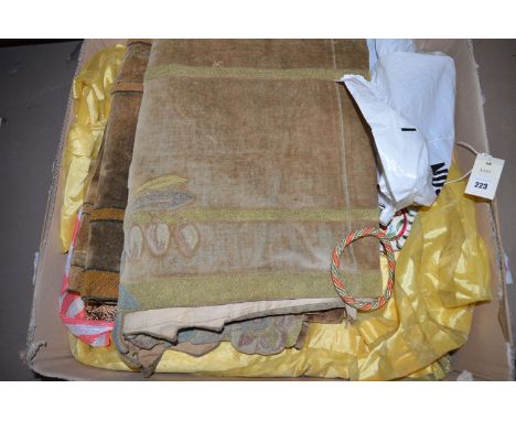 Two boxes of woolwork panels; tie-backs; curtains; etc.