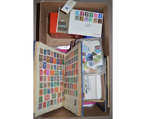 A small quantity of first day covers and loose stamps; together with three partially filled stamp albums.