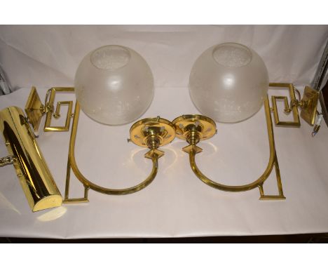 Christopher Wray: a pair of brass electric wall lights with opaque white shades; together with a picture light.