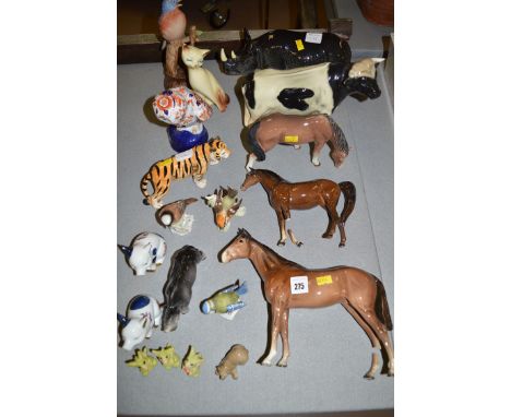 A quantity of assorted ceramic animals, including: three Beswick horses; two Goebel birds; etc.