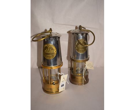 Protector Lamp & Lighting Co: two type 6M & Q miner's safety lamps.