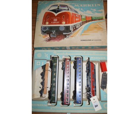 A Marklin No3121 railway engine and coaches set, in original box.