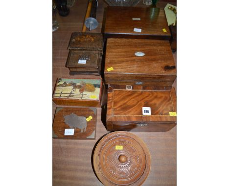 Two Victorian rosewood trinket boxes; an inlaid mahogany tea caddy; and five other boxes.