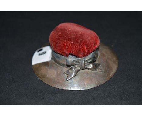 A silver Edwardian pin cushion, by Samuel Blackensee, Chester 1908, of hat form.