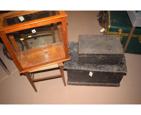 A black painted metal deed box; a bedroom occasional chair; a chemical balance case; a black painted wooden tool box; a helme