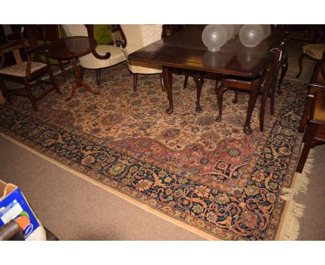 A machine made Prado Oriental Kashan super carpet, with scrolling floral decoration throughout, 360 x 270cms.