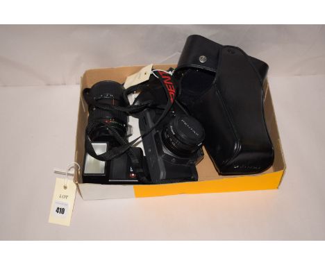 A Pentax SLR P30 T camera with 50 and 80mm lenses; a Pentax flash gun, carrying case and instruction leaflet.