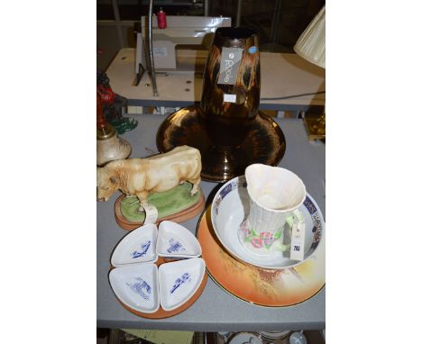 A Royal Doulton plaque 'Rustic England'; a Maling florally decorated jug; a modern Oriental bowl; a porcelain ware model of a