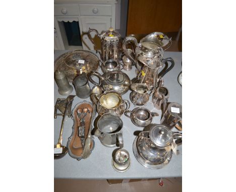 A quantity of silver plated ware, to include: teapots; candle snuffer and tray; ladle; cream jugs; together with two pewter t