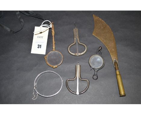 A silver bangle; a pair of giltmetal lorgnettes; other lorgnettes; a bullet handle sword pattern letter opening; and sundries