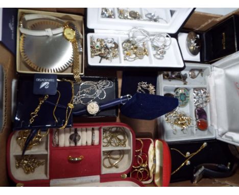 A good mixed lot of costume jewellery to include a quantity of silver, pendants, brooches, earrings, Swarovski necklaces, Str