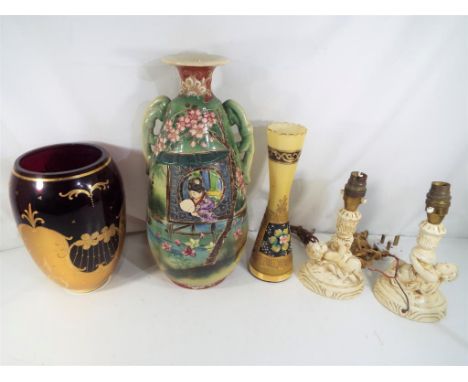 A hand-painted twin-handled Japanese vase, approximately 36 cm (h), a ruby glass vase, a further glass hand-painted vase and 