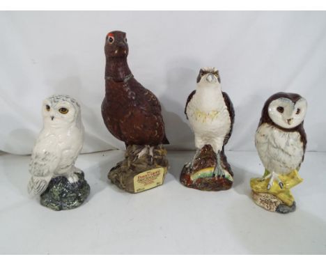 Royal Doulton - four ceramic Whisky decanters / bottles (empty) by Royal Doulton comprising Snowy Owl, Barn Owl and Osprey fo
