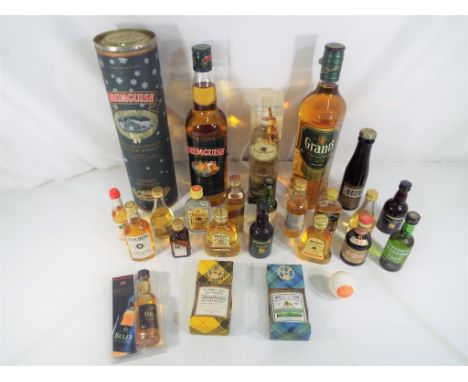 Whisky - a 70cl bottle of Drumguish single malt Highland Scotch Whisky in presentation box, a 70cl bottle of Grants sherry ca