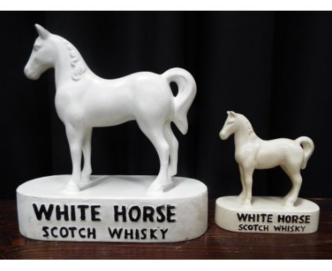 A White Horse Scotch Whisky ceramic advertising figurine of a horse approx 22cm (h)also included a smaller version (2) Est £3