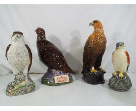 Beswick - four ceramic advertising decanters / bottles (empty) comprising an Osprey and Kestrel and Golden Eagle for Beneagle