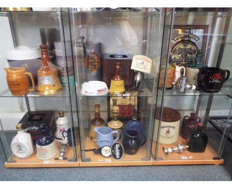 Breweriana - a large quantity Whisky related collectables to includes ice buckets, optics, empty Whisky jugs and tins, water 