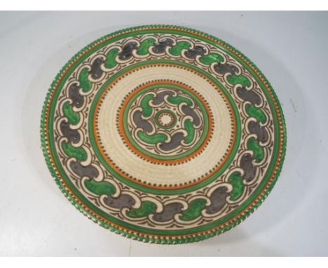 Charlotte Rhead - A Charlotte Rhead for Crown Ducal tubelined charger decorated in the Green Chain pattern in green, lustre g