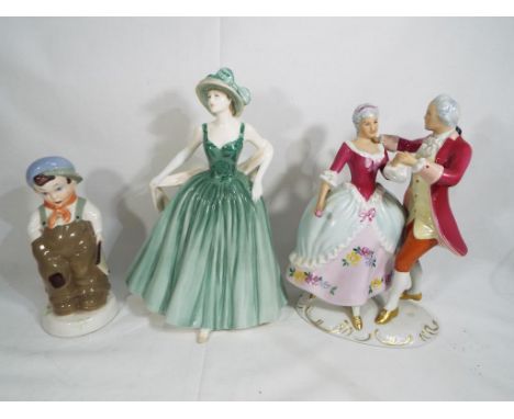 A Royal Doulton lady figurine entitled Eleanor, Royal Doulton Lady of the Year 2001 HN4015, a Royal Dux ceramic hand painted 
