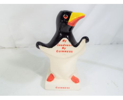 Carlton Ware - a Carlton Ware Guinness penguin lamp base, approximate height 18 cm (h). Estimate £30 - £40