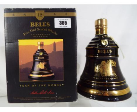 Bells fine old Scotch whisky aged 12 years, 1992 Year of the Monkey, sealed, 75 cl, 43% vol in Wade porcelain decanter finish