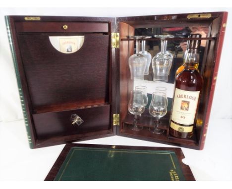 Aberlour single malt Scotch whisky - an extremely rare wood cased presentation set in the style of three books 'The Mystery o