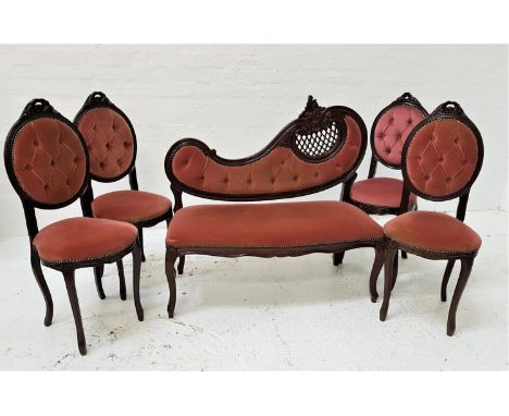 EARLY 20th CENTURY PARLOUR SUITEcomprising a small two seat sofa with a shaped button back with pierced decoration and decora