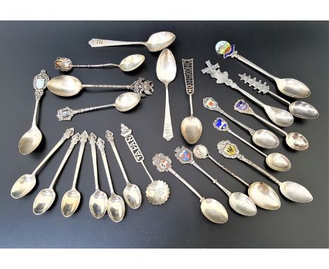 SELECTION OF SILVER SOUVENIR AND OTHER TEASPOONSincluding a set of six Thai spoons with deity decorated finials; various with