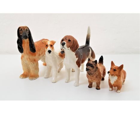 FIVE BESWICK DOG ORNAMENTScomprising an Afghan hound marked 'Hajubah Of Davlen', a fox terrier, a beagle marked 'Wendover Bil