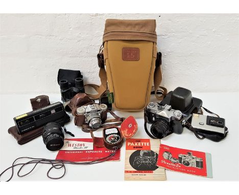 SELECTION OF CAMERAS AND EQUIPMENTincluding a Nikon 52mm Skylight lens, light meters, a Zenit Moskva 80 35mm camera in case, 