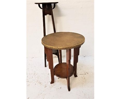 BRASS TOP OCCASIONAL TABLEwith floral and stylised decoration, standing on four shaped supports united by an undertier, 62cm 