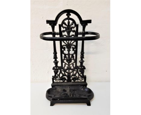 COALBROOKDALE STYLE METAL STICK STANDwith an arched pierced back with hoop front, above a removable shaped drip pan, 52.5cm h