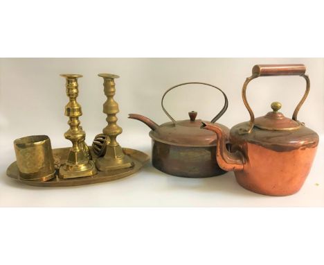 SELECTION OF BRASS AND COPPER WAREincluding two copper range kettles, brass trivet, oval three branch wall light, candlestick