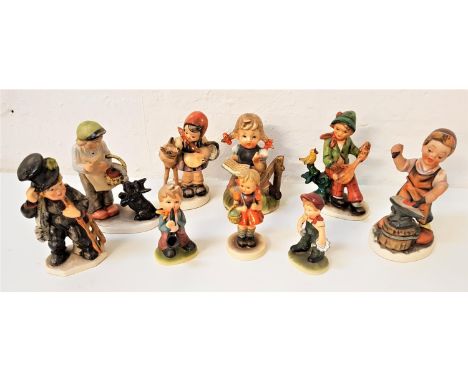 SELECTION OF FRIEDEL AND SIMILAR FIGURINESthe five Friedel examples depicting  a blacksmith, a boy seated and playing a mando