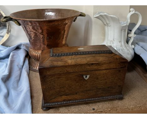 A large copper twin handled urn together with a rosewood tea caddy and a pottery jug