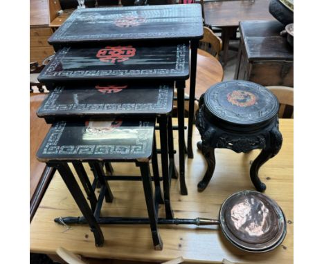 A quartetto nest of four black lacquer tables inlaid with shells together with a Chinese ebonised table and a copper bedwarmi