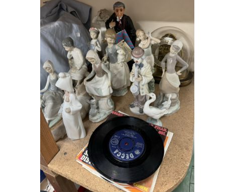Assorted Lladro and Nao figures together with records, a Fairweather Collection figure of a Barrister, anniversary clock etc 