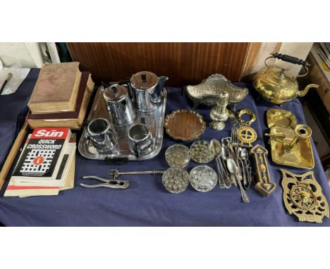 A brass chamber stick together with other brass wares, chrome part tea service, books etc 