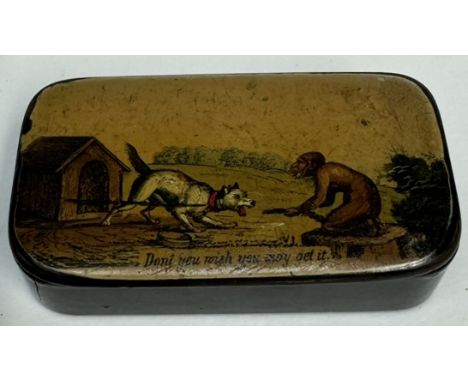 A papier mache snuff box printed with a scene of a dog in a kennel being taunted by a monkey "Don't you wish you might get it