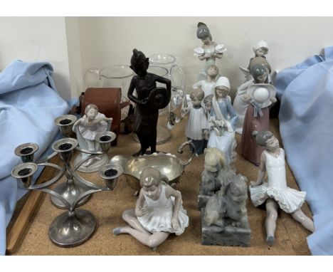 A collection of Lladro figures together with crystal jugs, carved figure, electroplated candlesticks, camera etc 