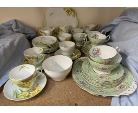 A Shelley daffodil pattern part tea service number 13670 together with a Queen Anne Gainsborough part tea service 