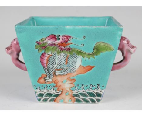 A Chinese famille rose enamelled turquoise ground porcelain two-handled pot, mark of Jiaqing but later, of square tapering fo