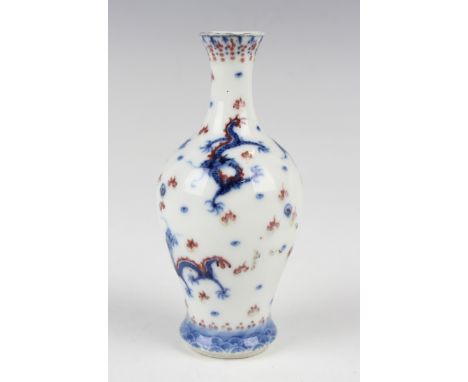 A Chinese underglaze blue and red decorated porcelain vase, mark of Qianlong but later Qing dynasty, of baluster form, painte